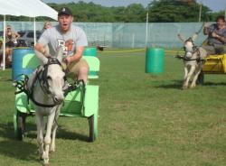 Cory Sturber, left, is driving for the finish but Joe Stropole and his donkey are charging hard on the inside. Cory Sturber, left, is driving for the finish but Joe Stropole and his donkey are charging hard on the inside.
